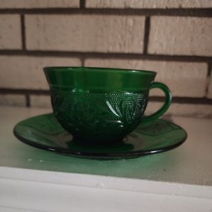 AH green sandwich pattern glass cup and saucer